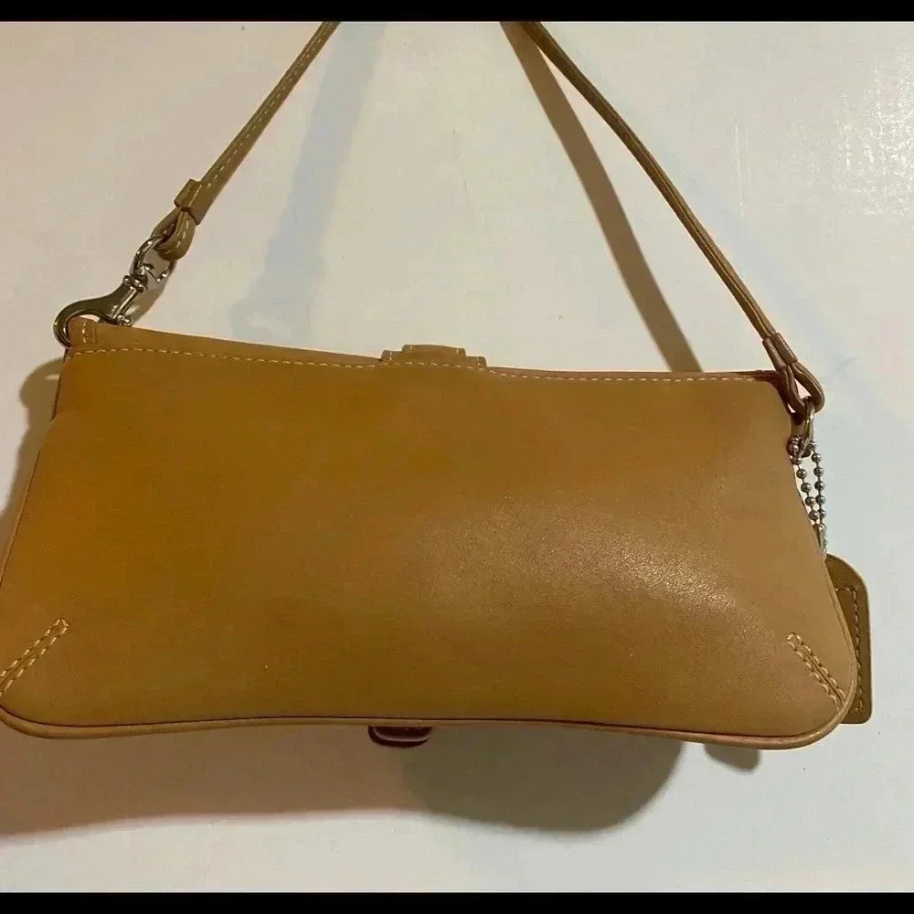 Coach vintage beige/ brown leather wristlet bag
